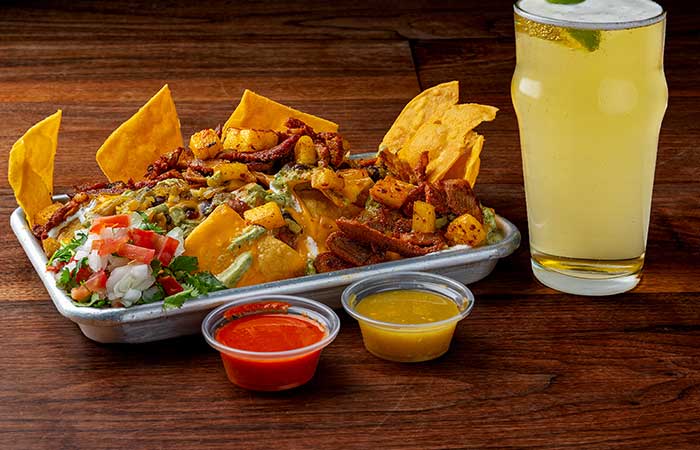 Nachos, with drink and side sauces