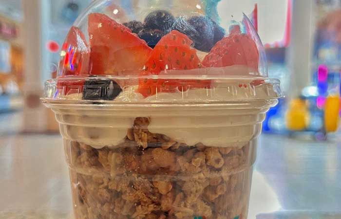 Yogurt Parfait, with granola, yogurt, strawberries and blueberries